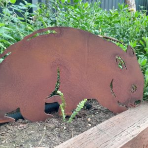 Wombat rusted metal garden stake